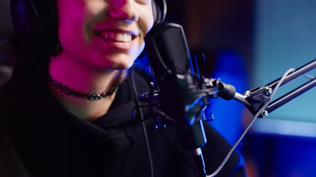 Voice Over Artist speaking into a microphone