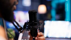 Voice Over artist using a professional microphone